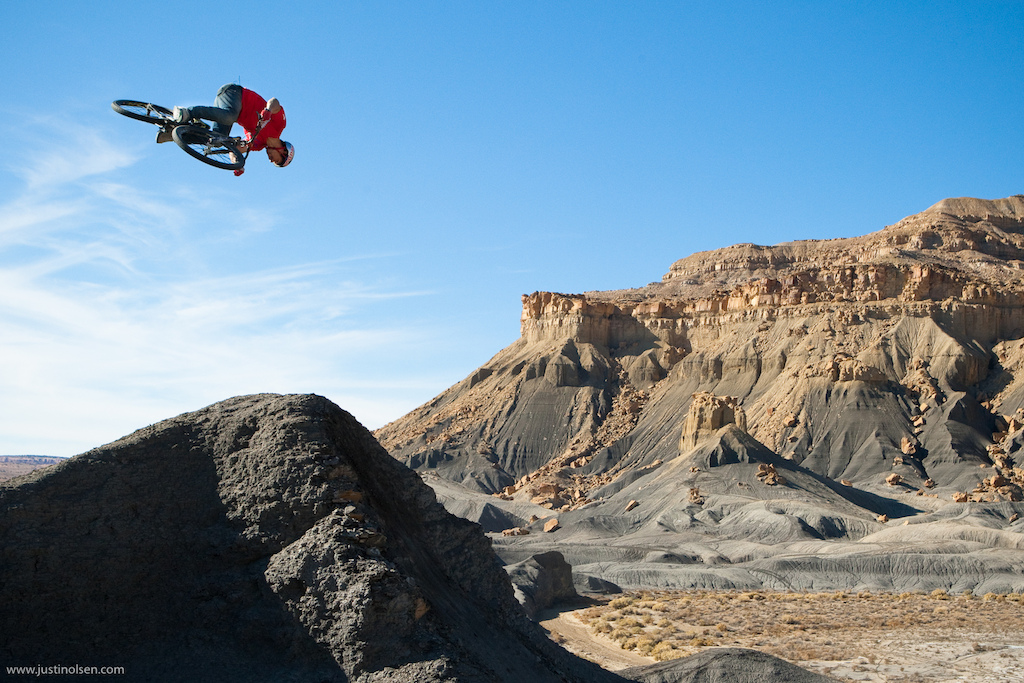 Bearclaw testing out the fruits of his labors. Looks like a pretty rad trick jump right What you can t see in this picture is the landing which was a super loose super steep 80 foot scree slope that most people would have a hard time just riding let alone tricking into.