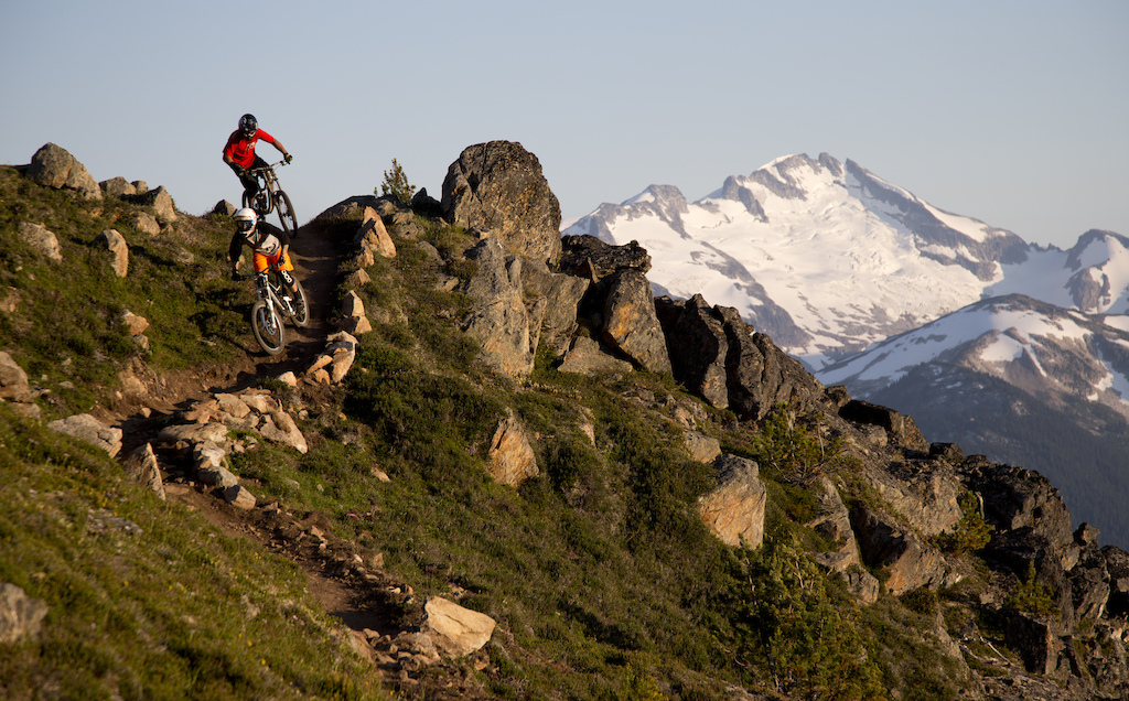 Mountain bike riders Seb Kemp and Dylan Sherrard ride their bikes along the top of the world bike trail at the peak of Whistler mountain in Whistler B.C. Saturday August 11 2012. THE CANADIAN PRESS Jonathan Hayward