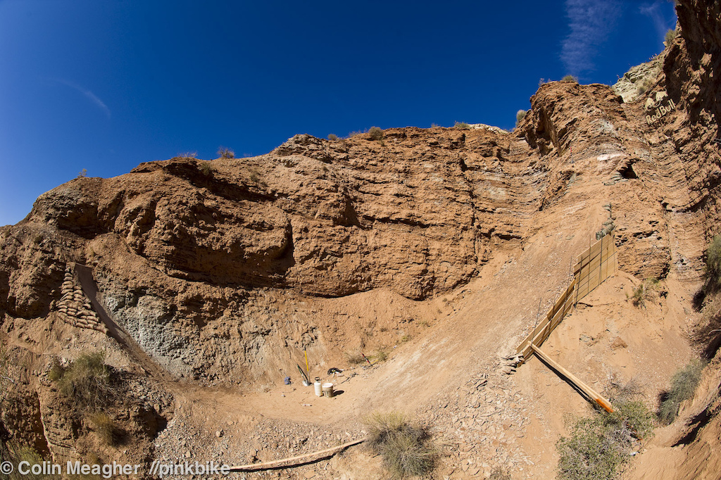 The scope and scale of the building on the site is amazing. I mean just look at the amount of dirt that was used to fill in this landing. And the sandbags for the sender afterwards. Looking over the hill it s like a small army went to work out here in the Utah desert.
