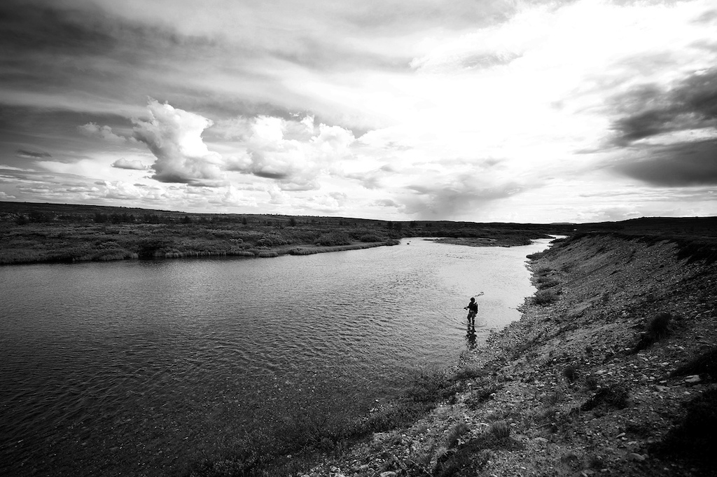 Good old friend and fly fishing buddy Andreas Lium doing som reco in a virgin river in Finnmark Norway.
