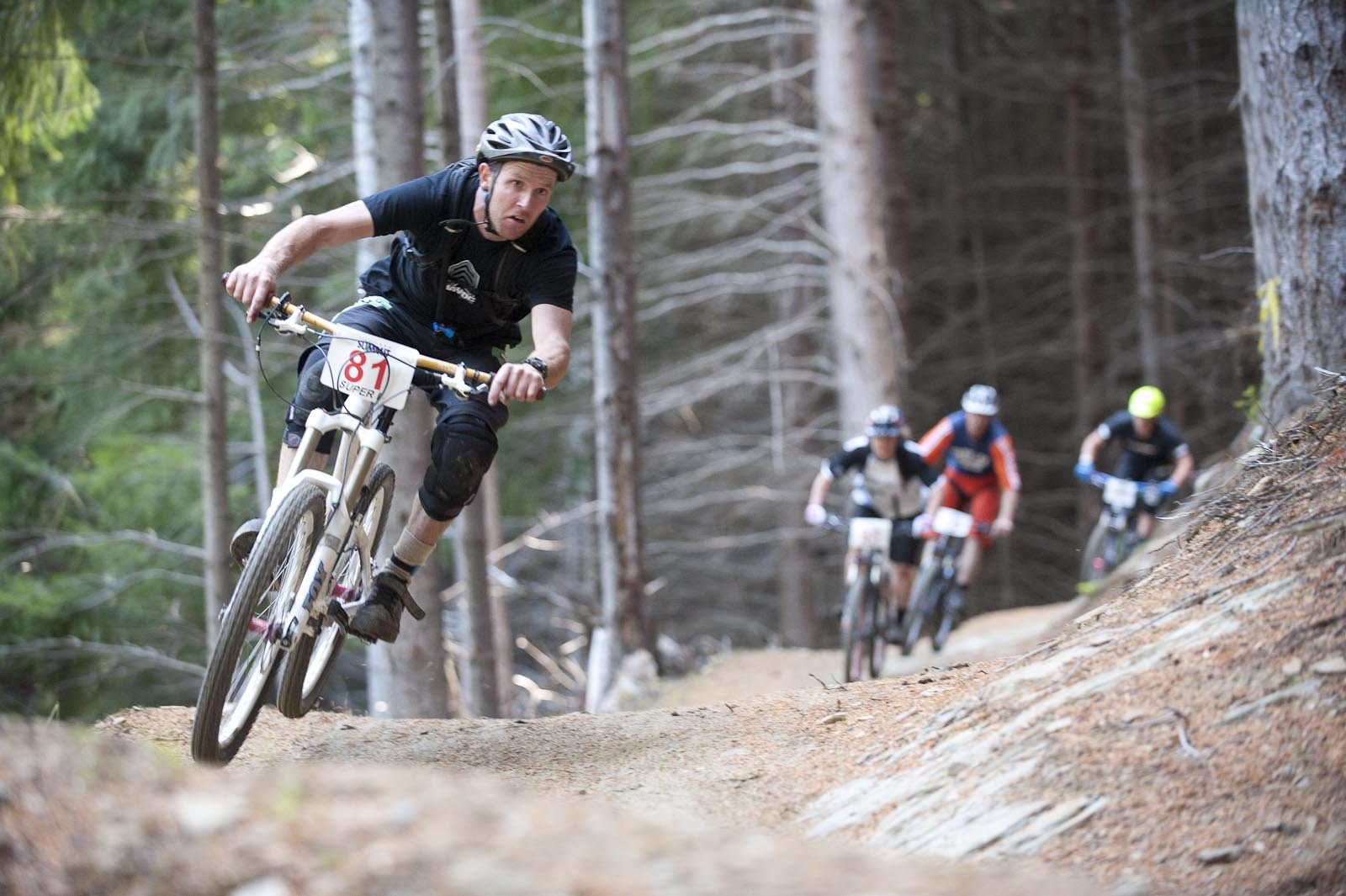 Racers compete in the Mountain Bike Super D race at the 2012 Queenstown Bike Festival