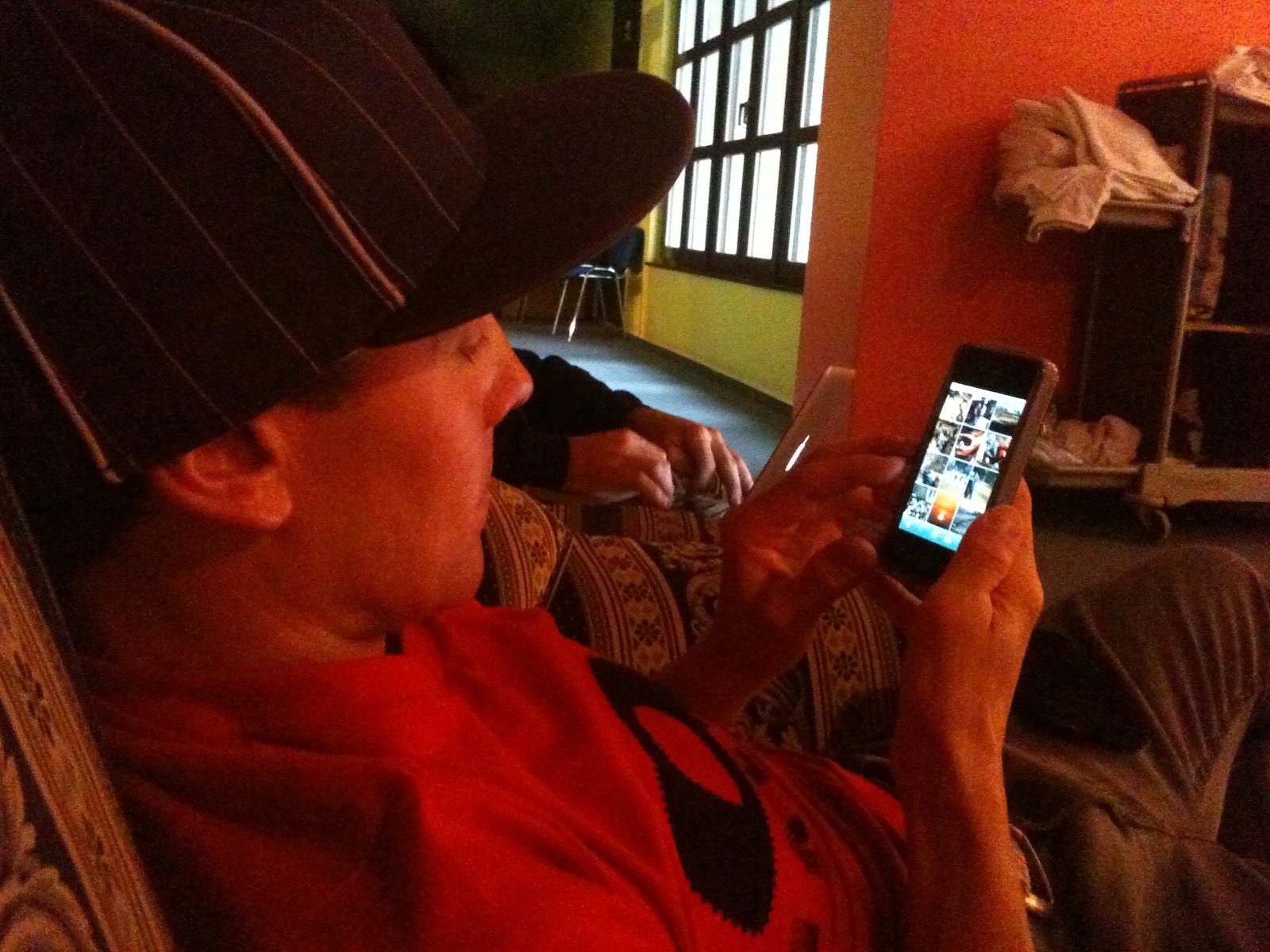 Mark Milward checking out photos Pinkbike Mobile